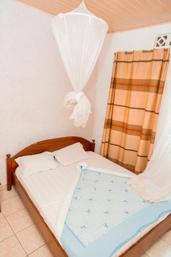 Auberge La Caverne Кигали Екстериор снимка