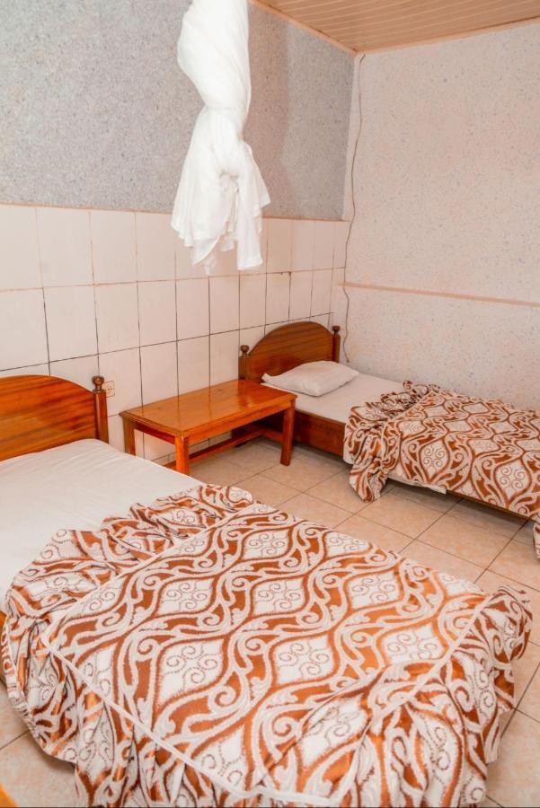 Auberge La Caverne Кигали Екстериор снимка